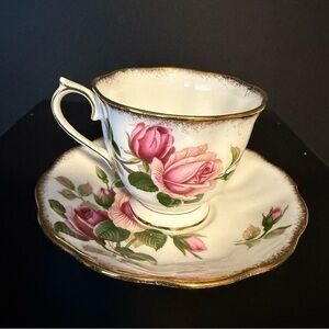 Royal Albert Anniversary Rose bone china footed tea cup and saucer set